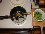 Onions sauteing once bacon gets a head start; Chopped stems added to pot once onions are clear