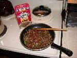 Red or Ancient Quinoa in preparation with onions, mushrooms, diluted pomegranate juice and parsley