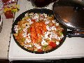 Vegetables returned to skillet around salmon and sprinkled w/ mushrooms