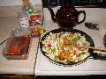 Pre-cut Salmon Fillets marinade in achiote mixed w/ olive oil and apple cider vinegar; vegetables are sauteed in coconut or olive oil