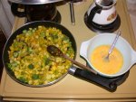 Sauteed vegetables and scallops awaiting addition of scrambled eggs